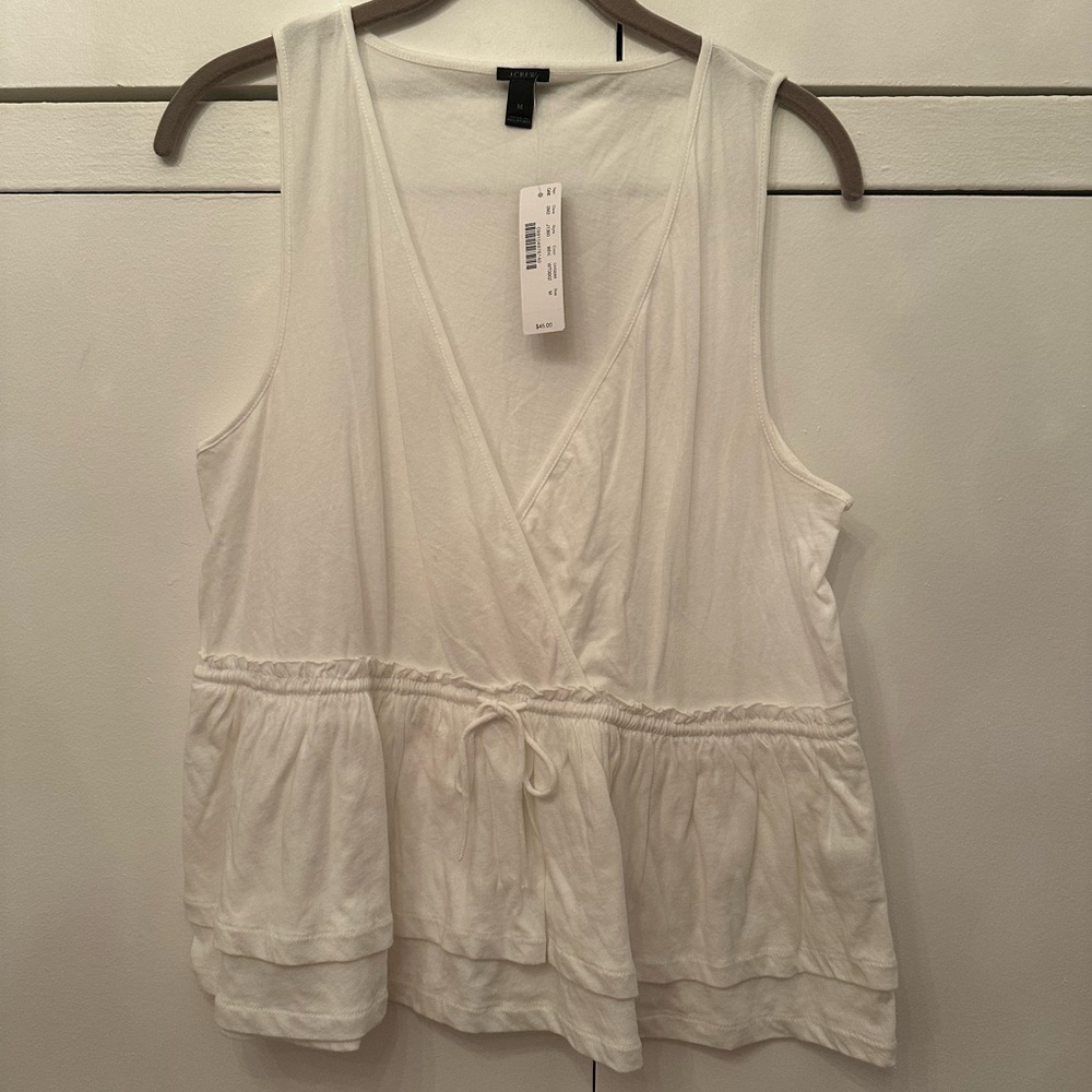 White sleeveless top